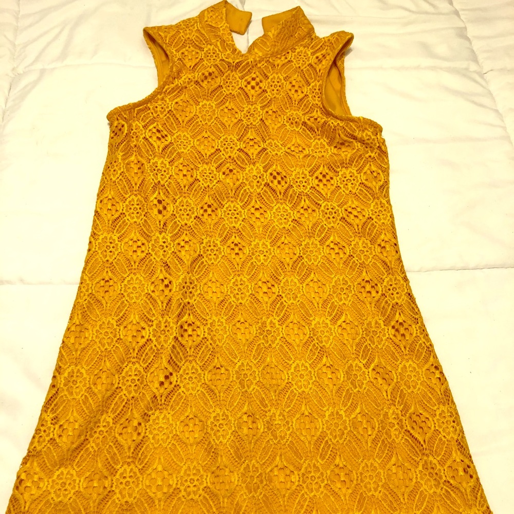 Mustard yellow lace dress. Mid-high neck.